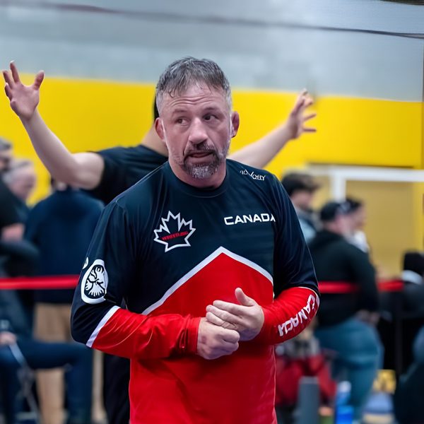 Clint Kingsbury, a Ken Chertow summer wrestling camp clinician