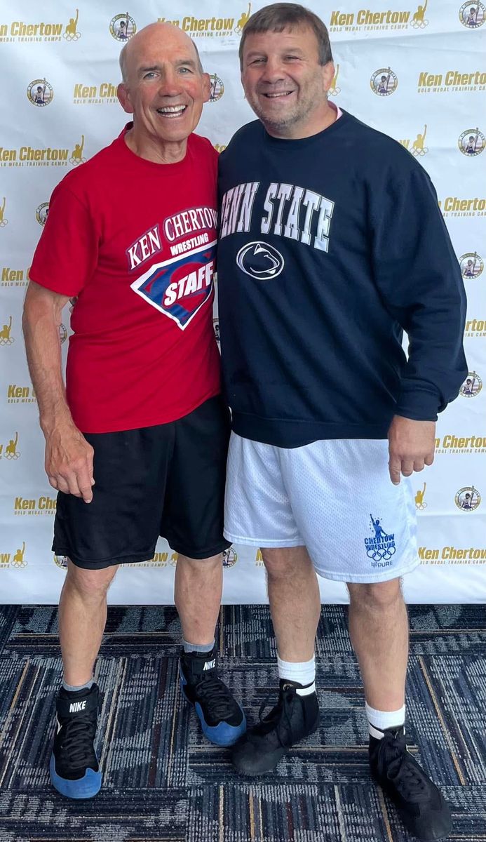 Ken Chertow wrestling camp coach John Fritz standing with Ken Chertow